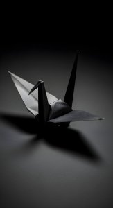 Minimalist Black Origami Crane Wallpaper HD 4K Aesthetic Dark Mode
